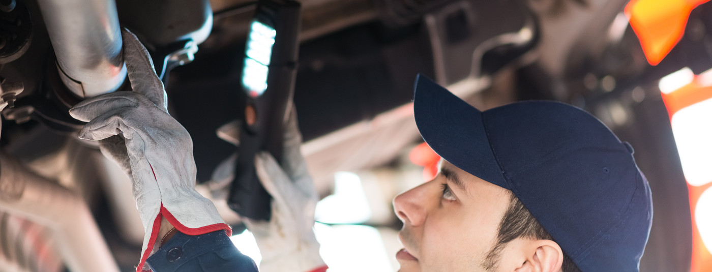 Mechanic doing an MOT inspection - MOT Testing Colchester